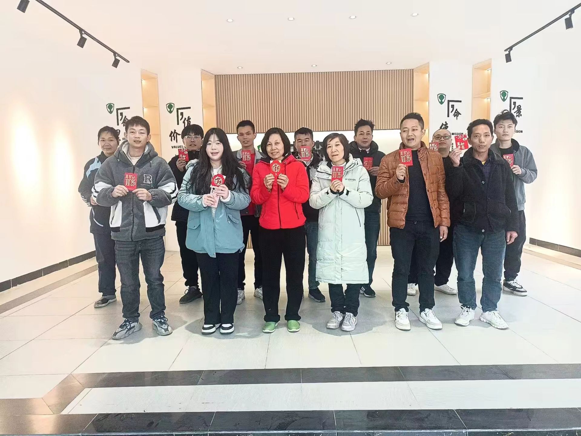 Companies give lucky red envelopes to kick off the new year.